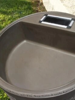 Round Rain Barrel With Planter, 35 Gallons 9 Round Rain Barrel With Planter, 35 Gallons -Gardeners Supplies Sales 8612856WALNT 02V tif